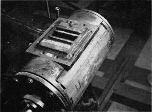 Figures 25 and 26.—Cylinder with valve box removed, showing valve face.