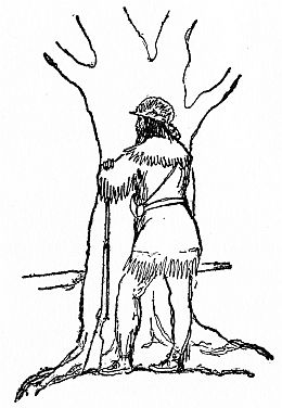 Woodsman stanind behind tree and holding a rifle