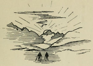 Skiers, a mountain sunset