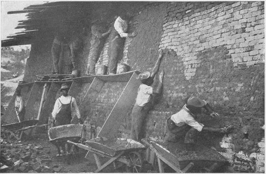 AT WORK IN THE SCHOOL'S BRICK-YARD